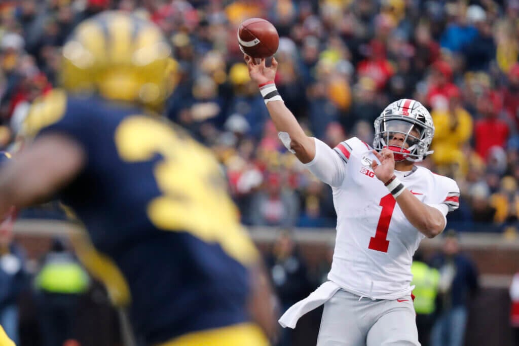 Nov 30, 2019; Ann Arbor, MI, USA; Ohio State Buckeyes quarterback Justin Fields (1) passes in the second half against the Michigan Wolverines at Michigan Stadium. Mandatory Credit: Rick Osentoski-USA TODAY Sports