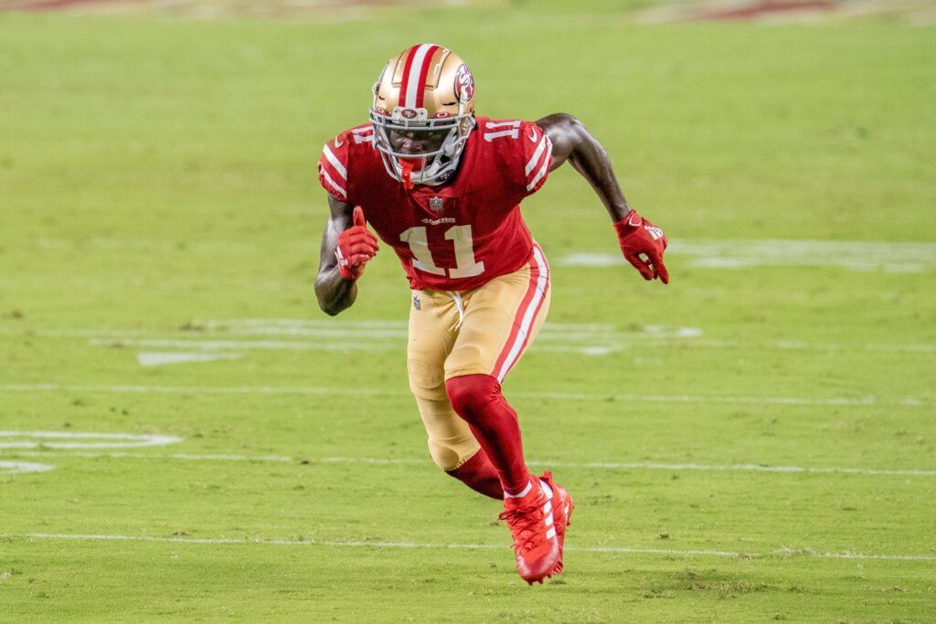 Brandon Aiyuk runs a route.