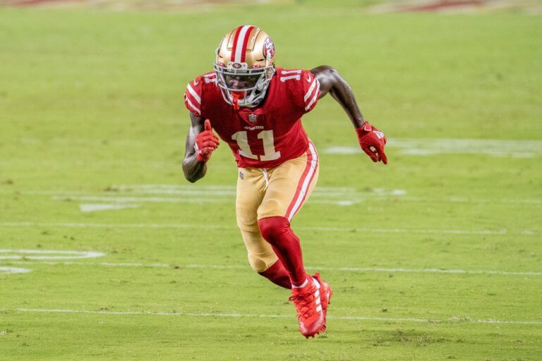 Brandon Aiyuk runs a route.