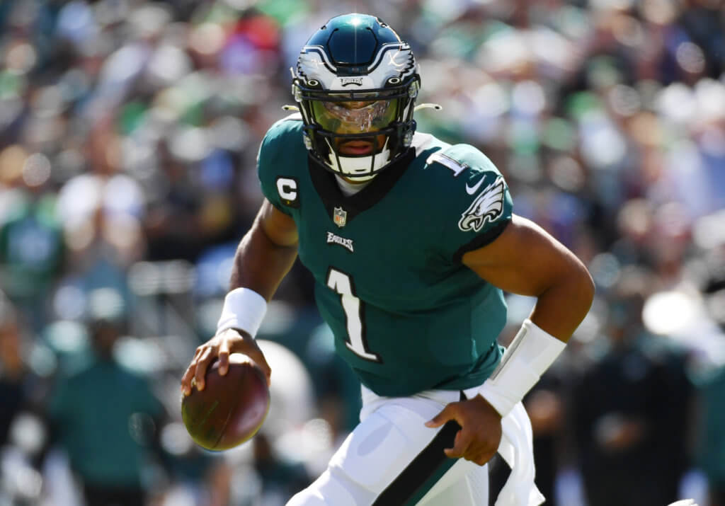Jalen Hurts rolls out of the pocket looking to do some damage.